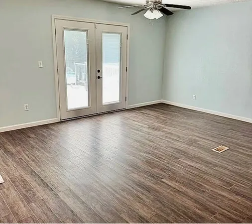 an empty room with windows