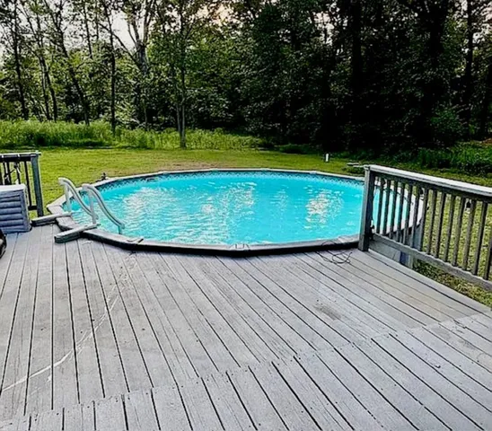 a view of sitting space on wooden deck