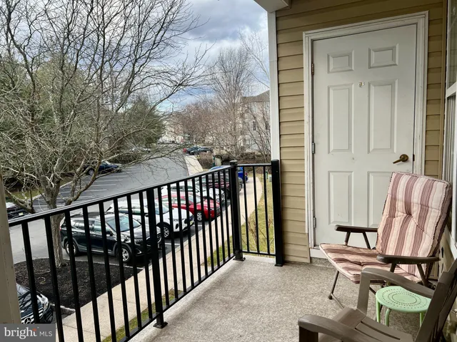 a view of a two chair in the balcony