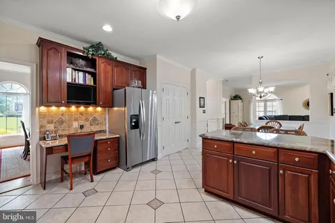 a workspace with furniture and a window