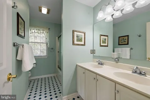 a view of a chair and tables back yard of the house