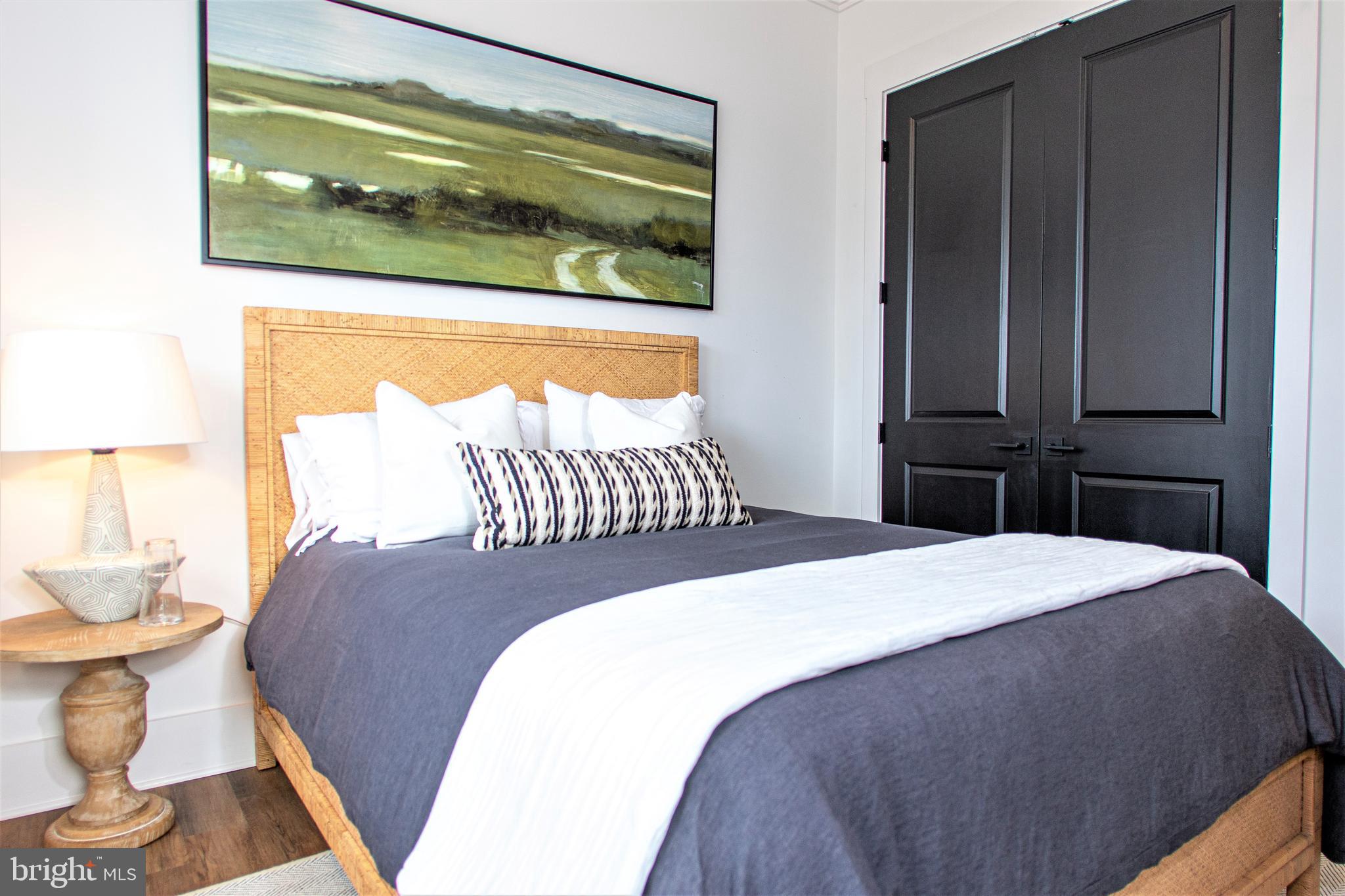 Tbb Highland Way, Unit INSPIRE Gettysburg, PA 17325 - Photo 12 of 46 a bedroom with a bed and wooden floor