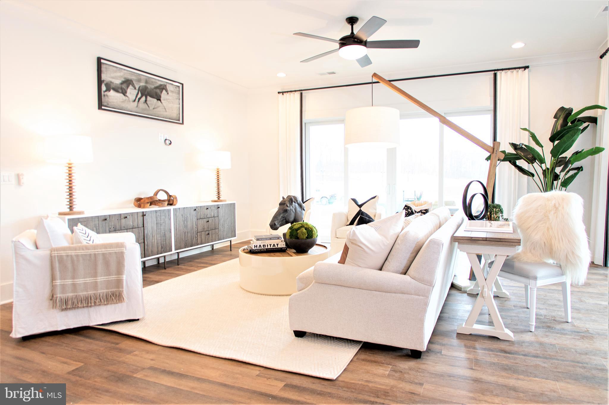 Tbb Highland Way, Unit INSPIRE Gettysburg, PA 17325 - Photo 21 of 46 a living room with furniture and wooden floor