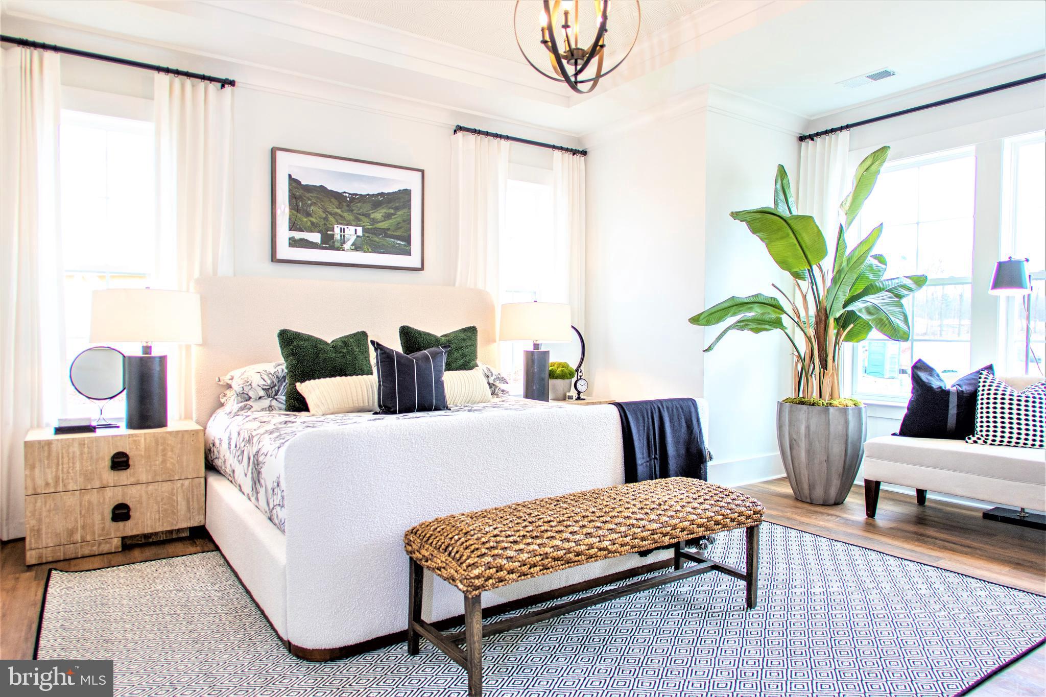 Tbb Highland Way, Unit INSPIRE Gettysburg, PA 17325 - Photo 23 of 46 a bedroom with a bed and a couch