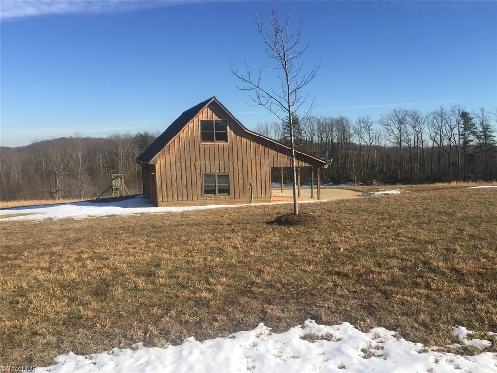 627 Mount Herman Church Road Mount Airy, NC 27030 - Photo 18 of 20 Detached garage /carriage house w/ basketball and child play equipment as well