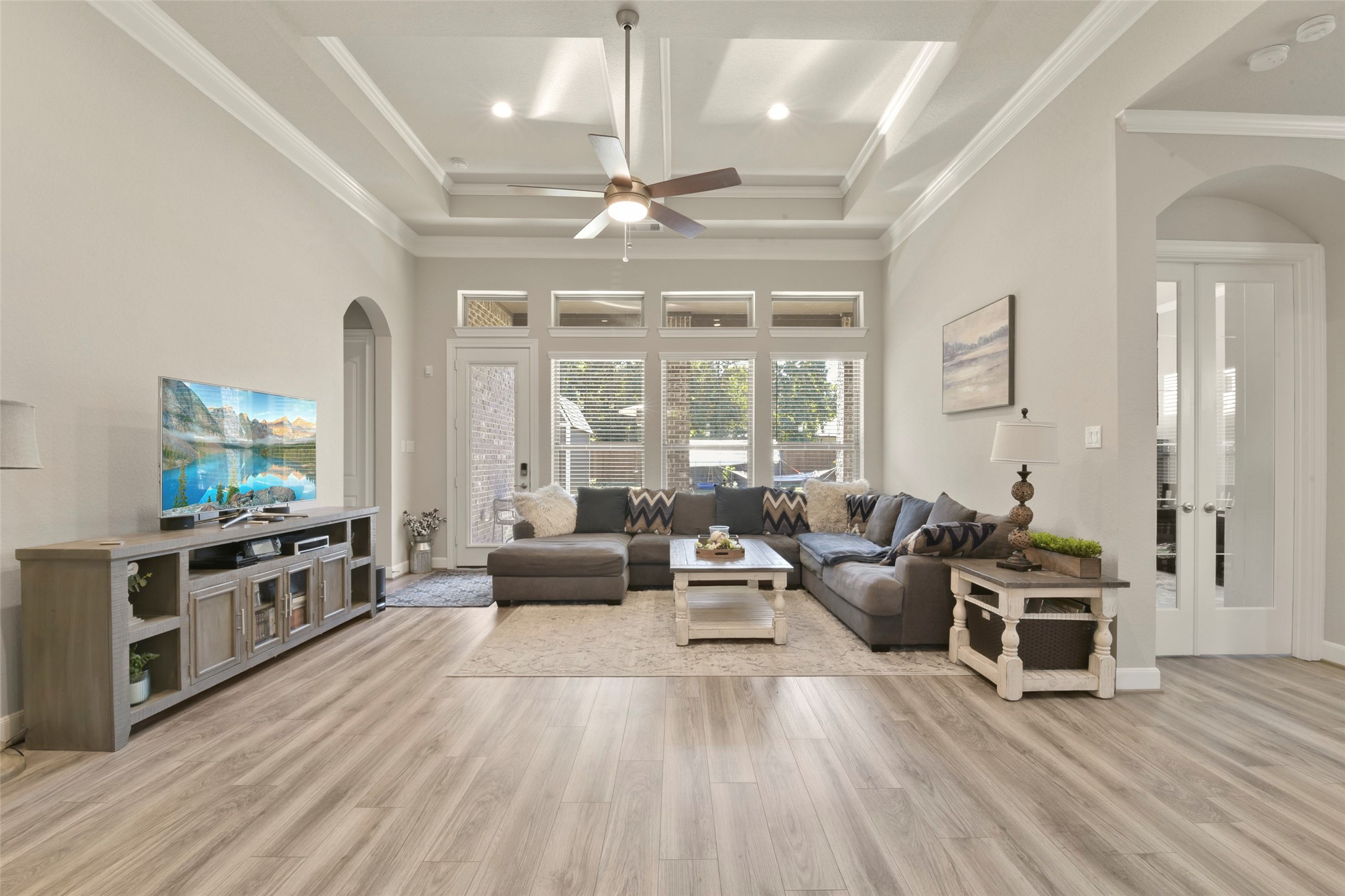4582 Silver Moon Drive Spring, TX 77386 - Photo 17 of 48 a living room with furniture and a flat screen tv
