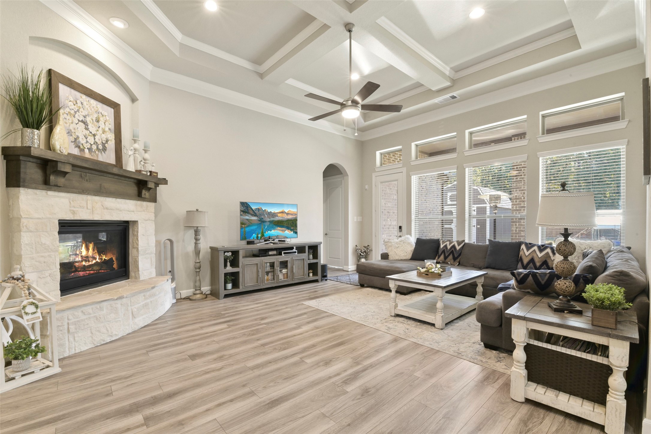4582 Silver Moon Drive Spring, TX 77386 - Photo 18 of 48 a living room with furniture fireplace and flat screen tv