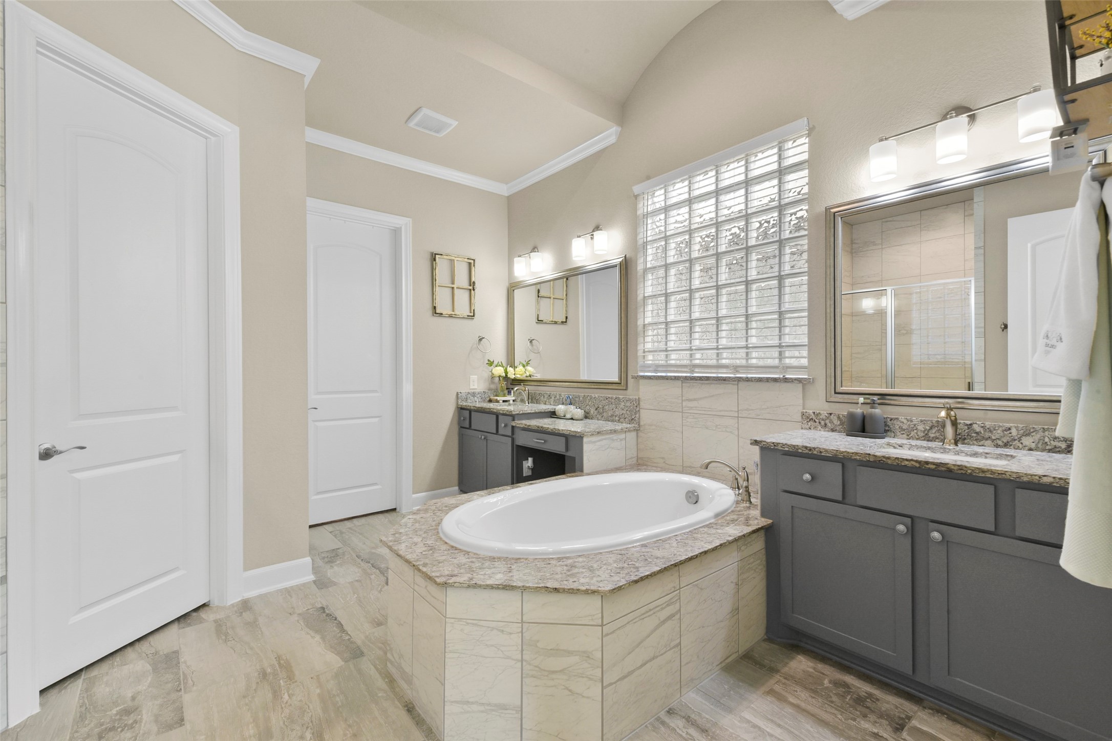 4582 Silver Moon Drive Spring, TX 77386 - Photo 27 of 48 a bathroom with a sink double vanity and a mirror
