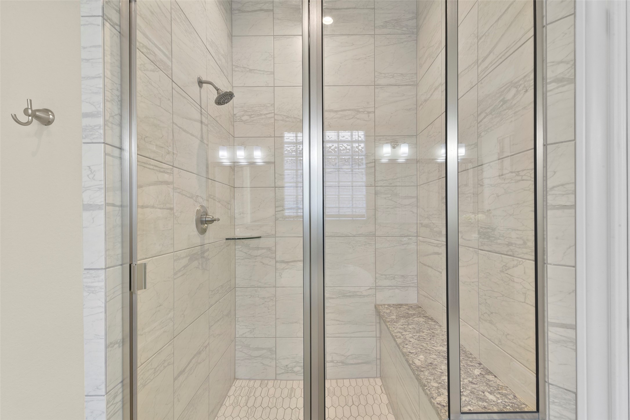 4582 Silver Moon Drive Spring, TX 77386 - Photo 32 of 48 a bathroom with a glass shower door