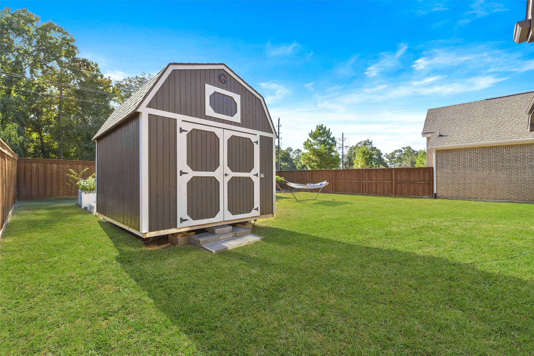 4582 Silver Moon Drive Spring, TX 77386 - Photo 47 of 48 a front view of a house with a yard