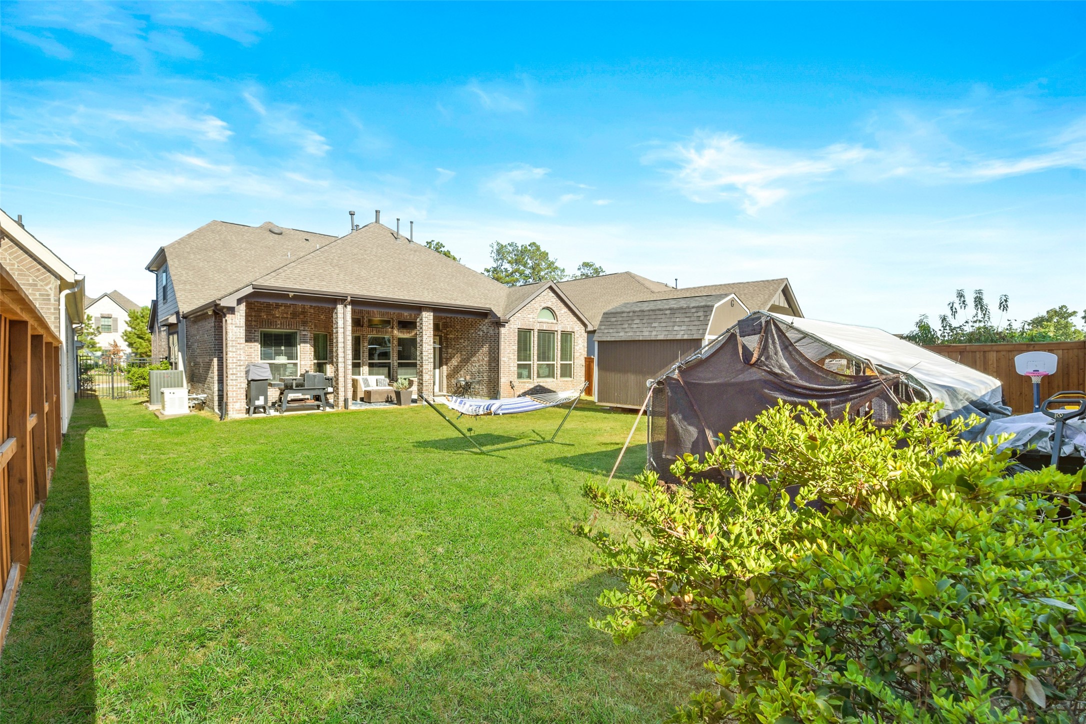 4582 Silver Moon Drive Spring, TX 77386 - Photo 48 of 48 a front view of a house with a garden