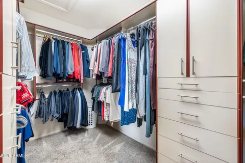 a balcony with furniture and a potted plant