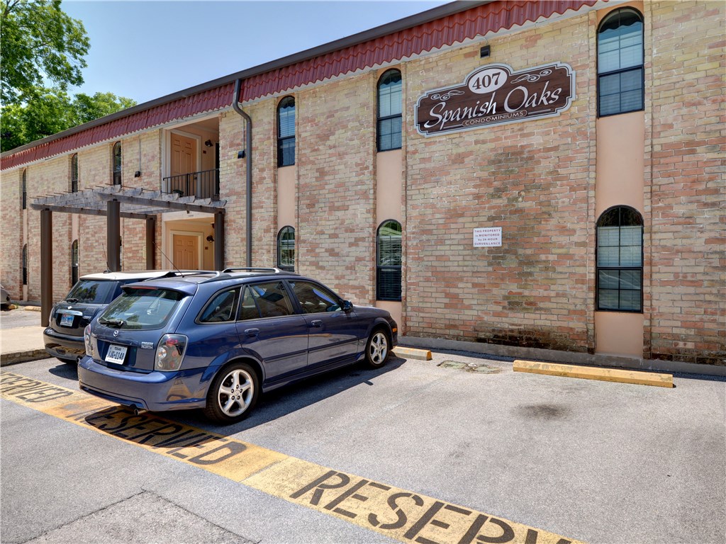 407 East 45th Street, Unit 210 Austin, TX 78751 - Photo 16 of 16 a car parked in front of a building
