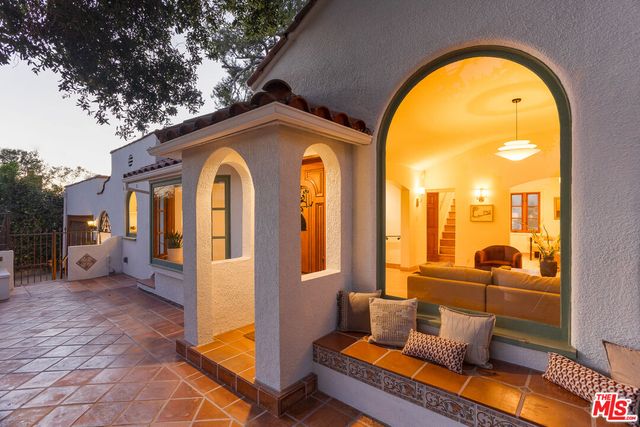 a view of swimming pool with outdoor seating