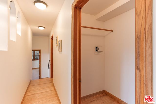 a view of a bathroom from a hallway