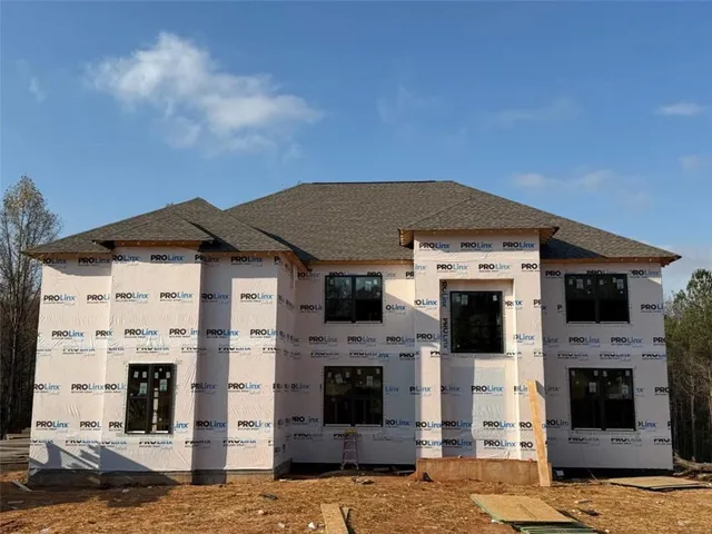 a front view of a house with a fireplace