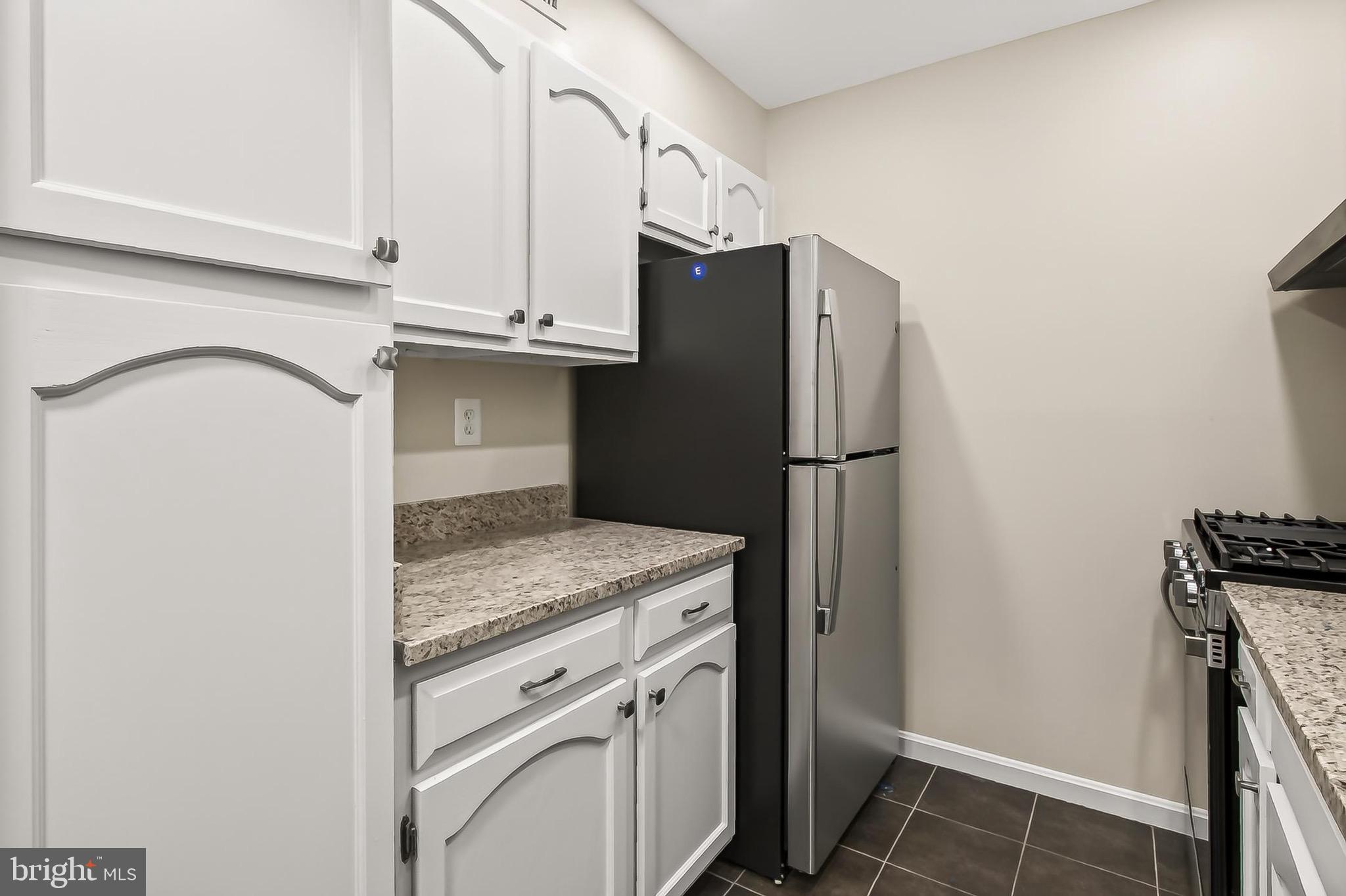 5835 Cove Landing Road, Unit 304 Burke, VA 22015 - Photo 11 of 37 New stainless appliances, granite countertops...