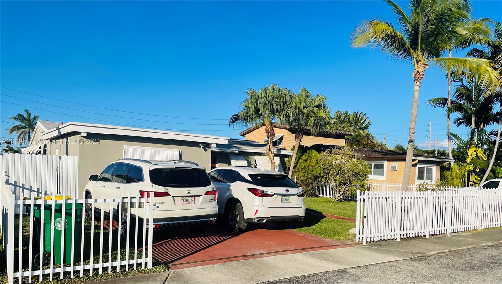 a front view of a house with a garage