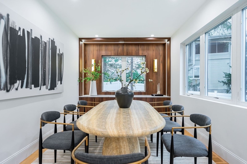 98 Hunnewell Street Needham, MA 02494 - Photo 16 of 36 a view of a dining room with furniture window and outside view