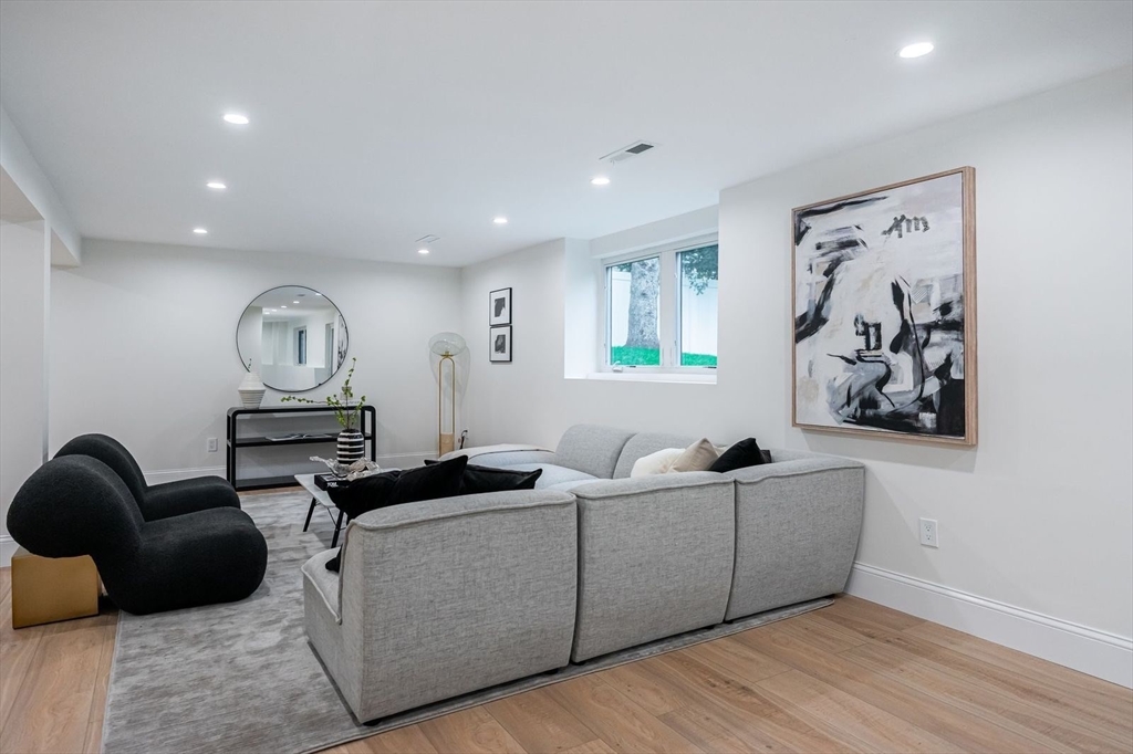 98 Hunnewell Street Needham, MA 02494 - Photo 27 of 36 a living room with furniture