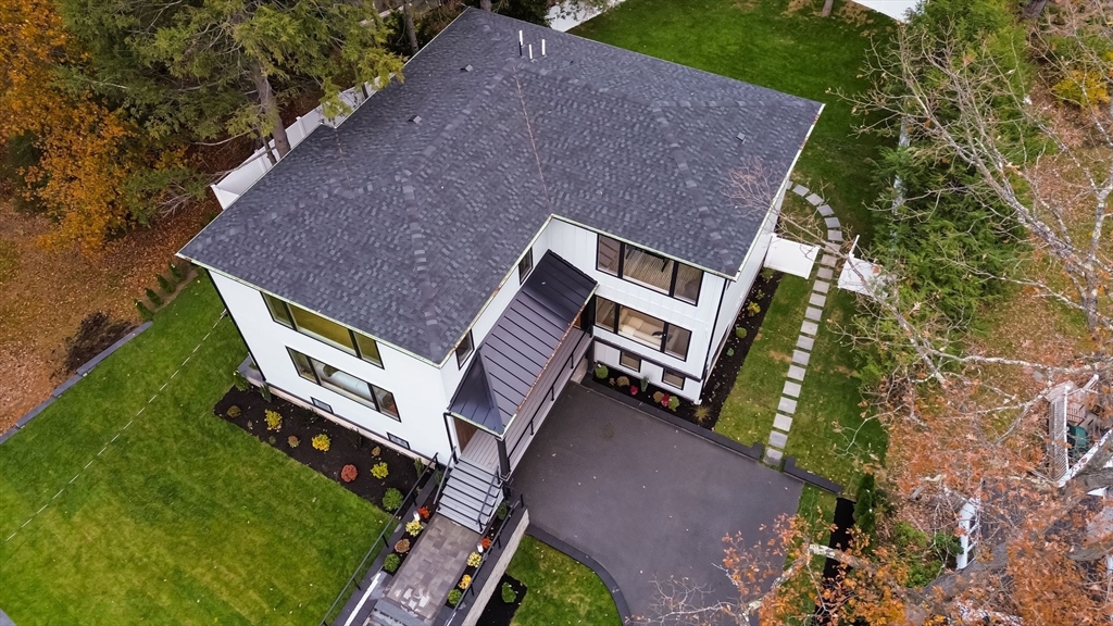98 Hunnewell Street Needham, MA 02494 - Photo 3 of 36 a aerial view of a house with a yard