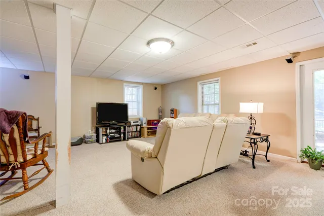 a bedroom with bed and a window