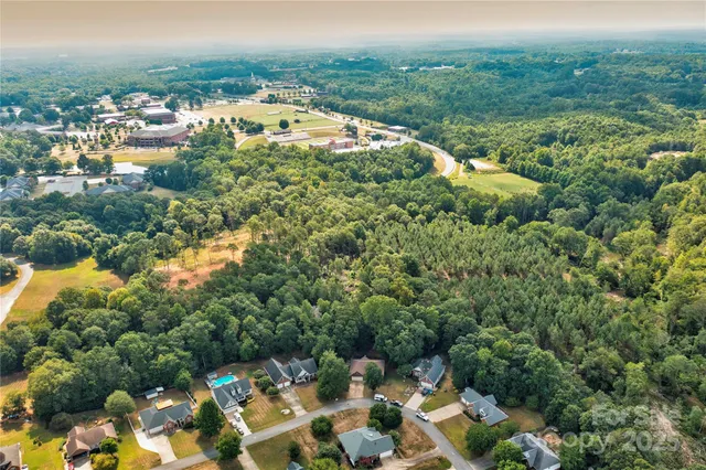 a view of a porch with chairs and backyard