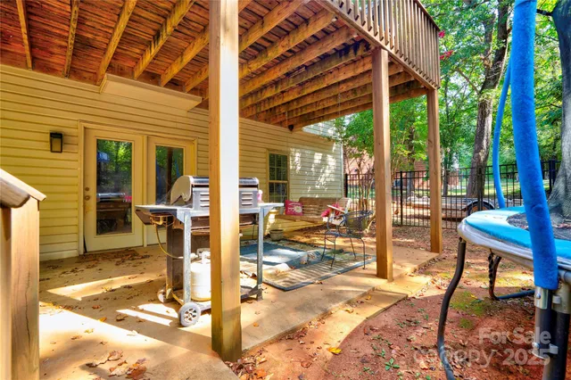 a view of a patio with furniture