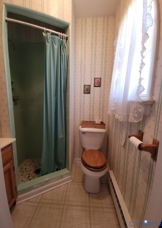 8241 Virginia Avenue West Point, VA 23181 - Photo 15 of 18 a bathroom with a toilet and a shower