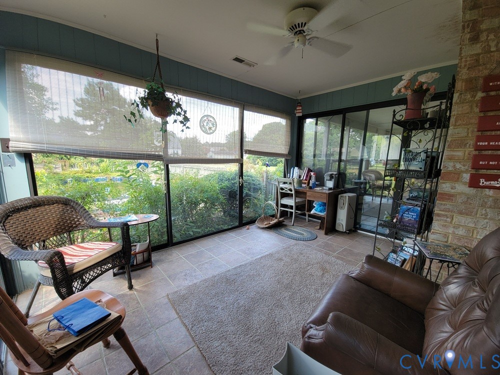 8241 Virginia Avenue West Point, VA 23181 - Photo 18 of 18 a view of a livingroom with furniture and a floor to ceiling window