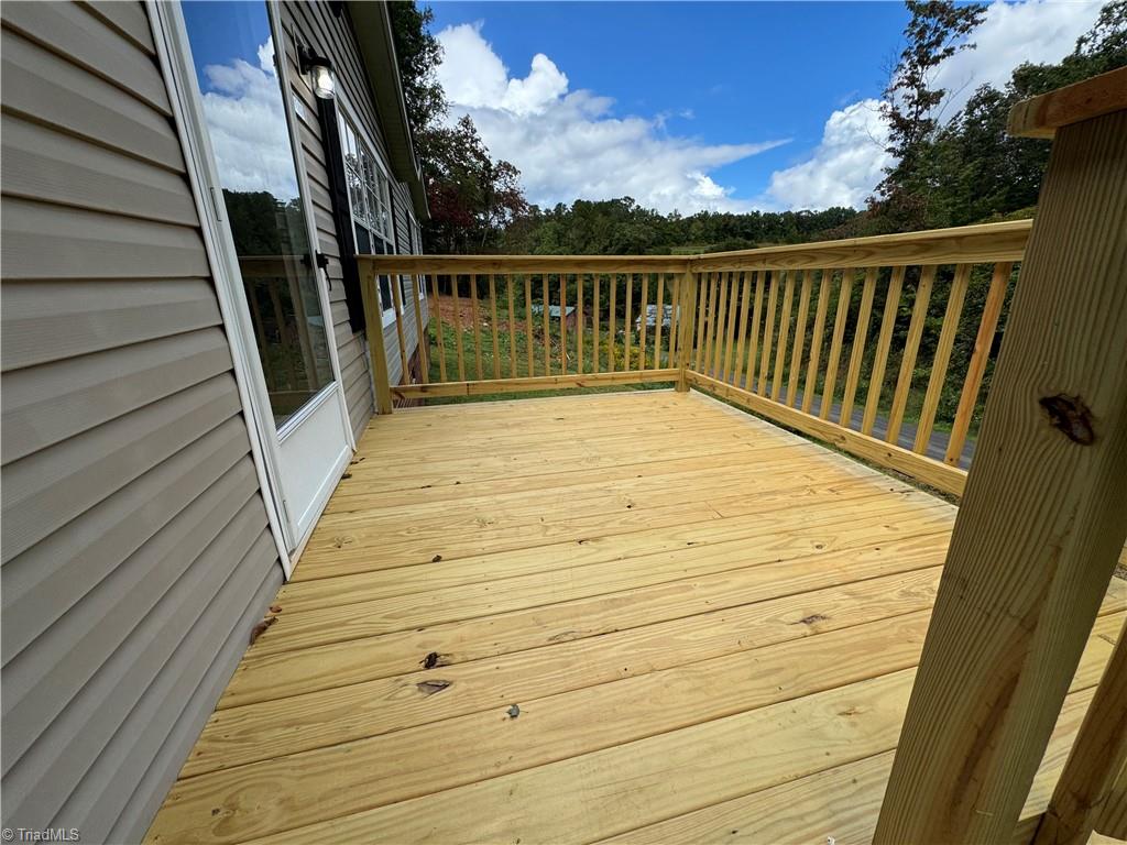 315 Marshall Farm Road Mount Airy, NC 27030 - Photo 4 of 50 Brand new deck on the front & back