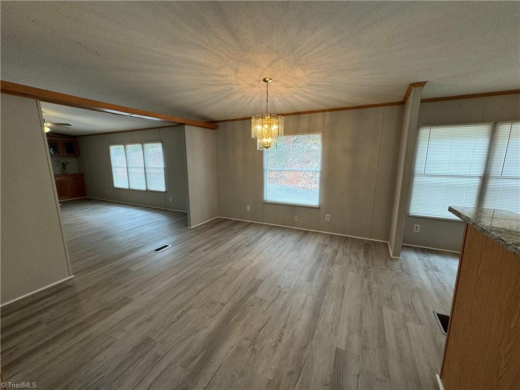 315 Marshall Farm Road Mount Airy, NC 27030 - Photo 8 of 50 Large dining room with chandelier