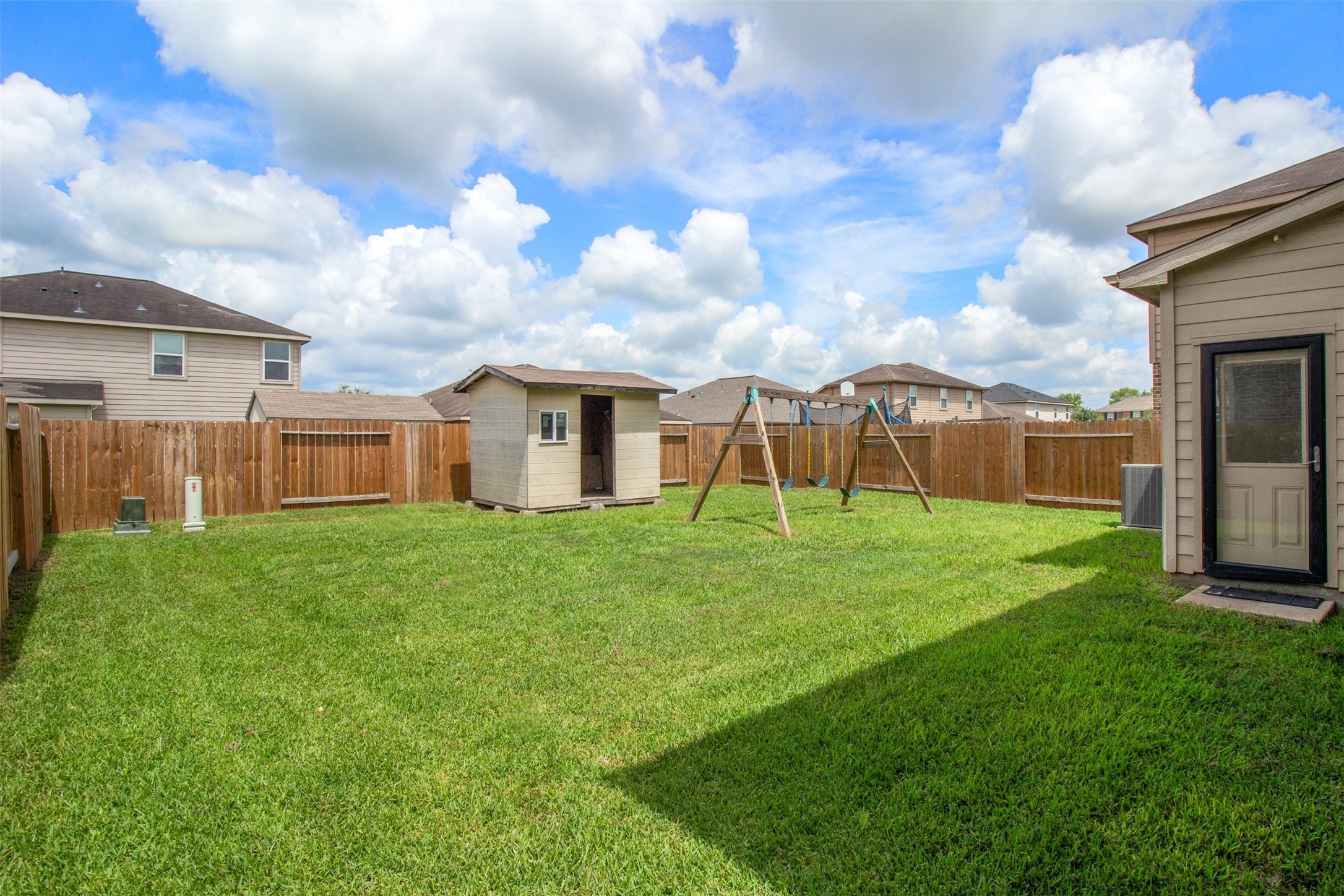 9426 Grand Spark Drive Rosharon, TX 77583 - Photo 22 of 31 It offers a wonderful blend of space and simplicity, creating an easy-to-maintain outdoor setting that's ready for your personal touch.