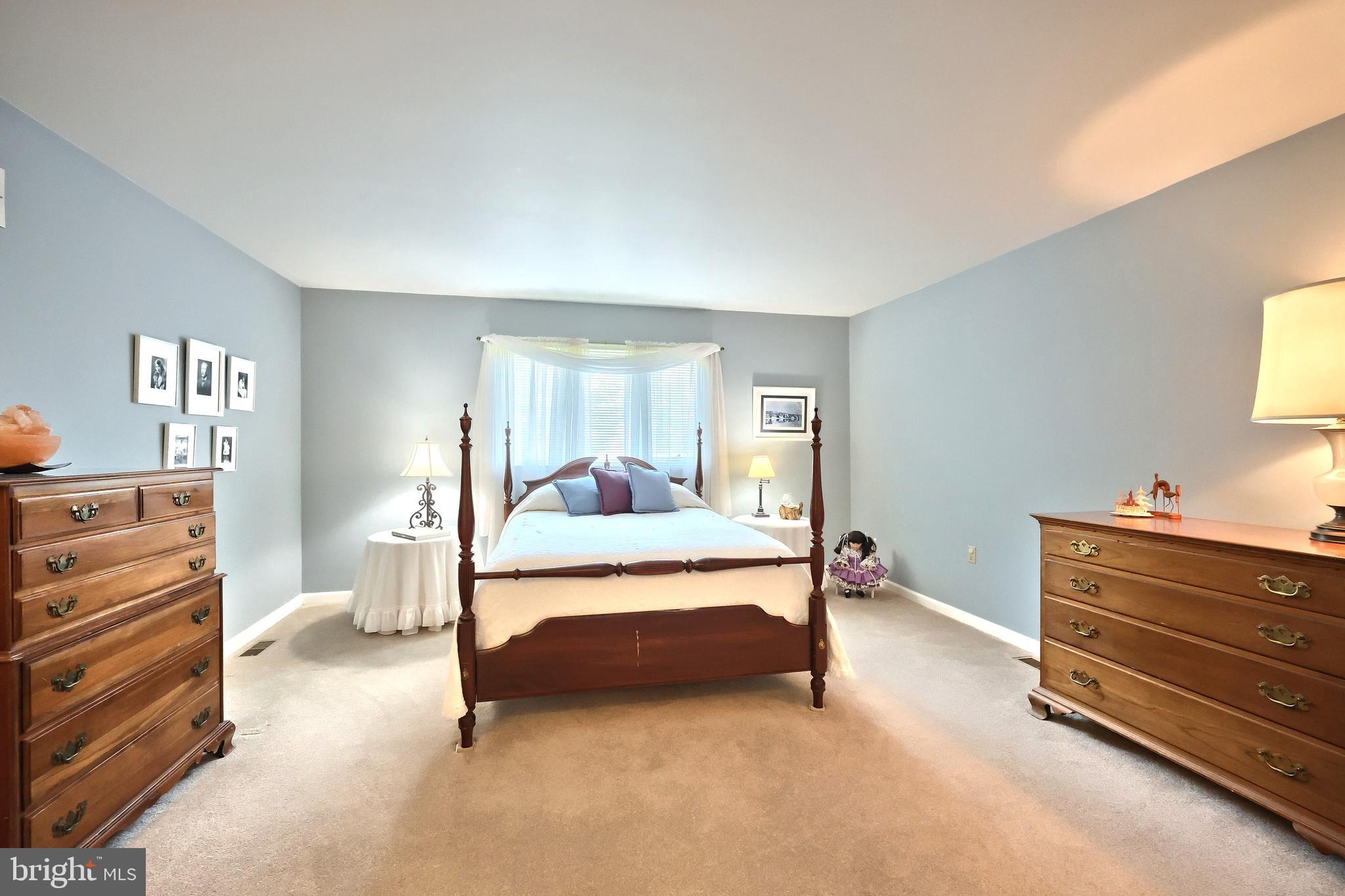 355 Sachs Road Gettysburg, PA 17325 - Photo 21 of 49 a bedroom with furniture and a lamp