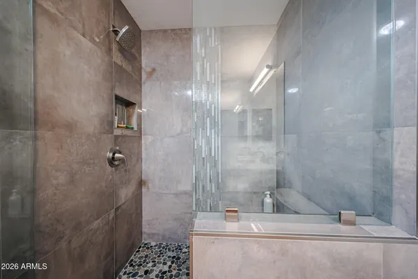 a room with furniture and a chandelier