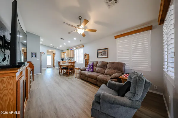 a living room with furniture and a window