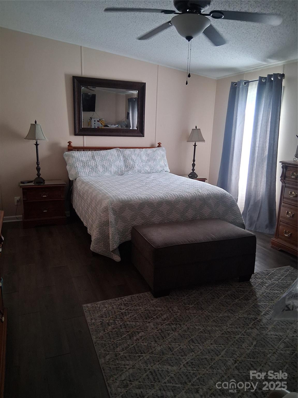 315 South Grandview Road Clover, SC 29710 - Photo 8 of 11 a bed sitting in a spacious bedroom next to a window