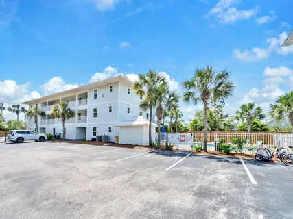 a view of a building with a yard
