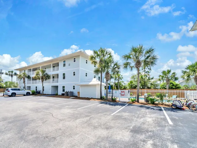 a view of a building with a yard