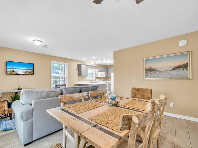 a living room with furniture and a table