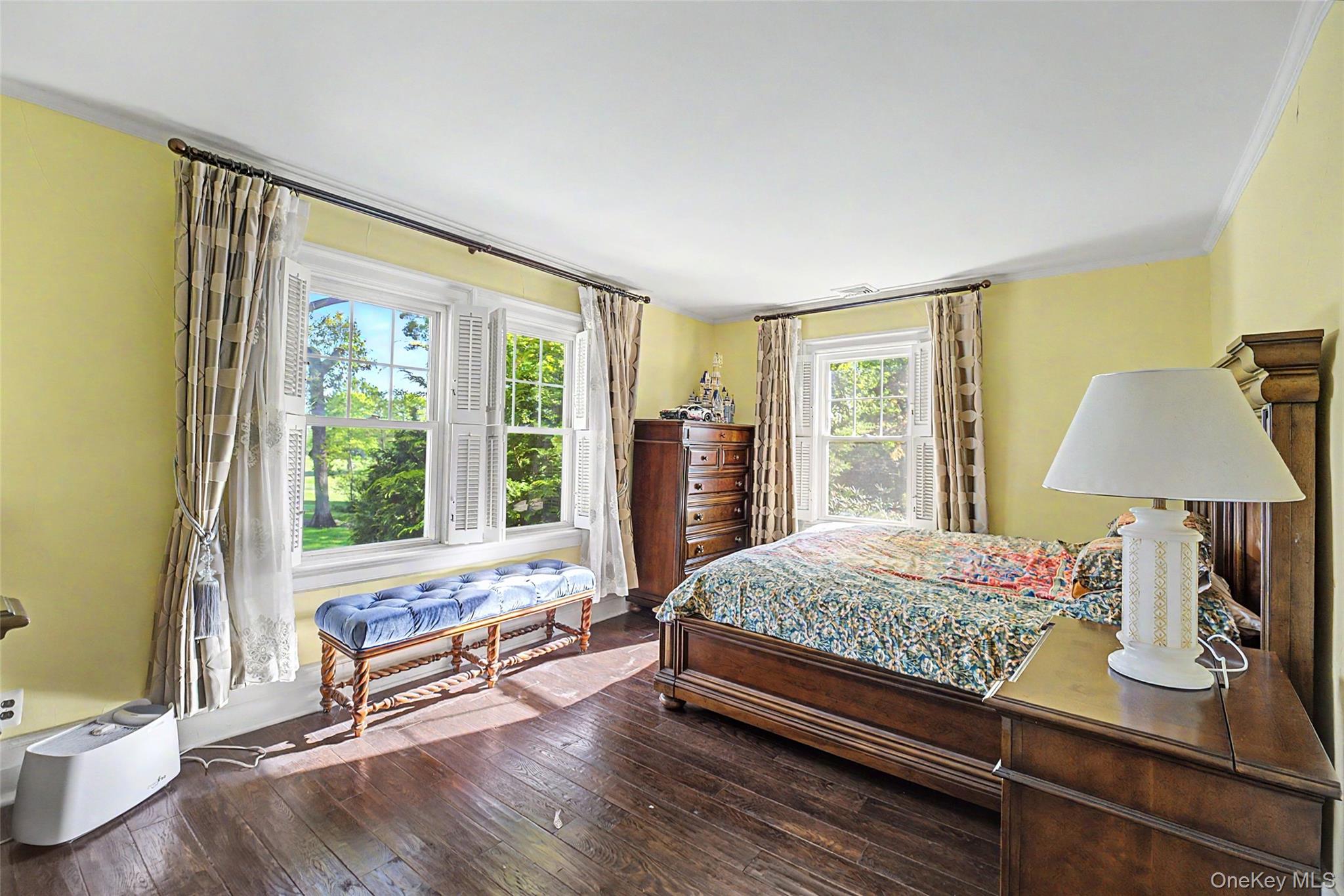 23 Townsend Road Glen Cove, NY 11542 - Photo 16 of 23 a bedroom with a bed and wooden floor