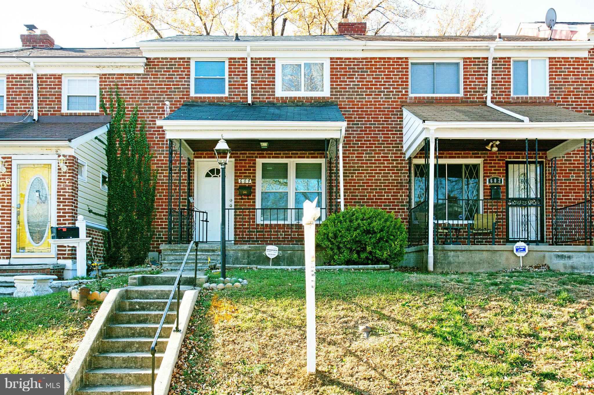 604 Brisbane Road Baltimore, MD 21229 - Photo 1 of 30 front view of a house with a yard