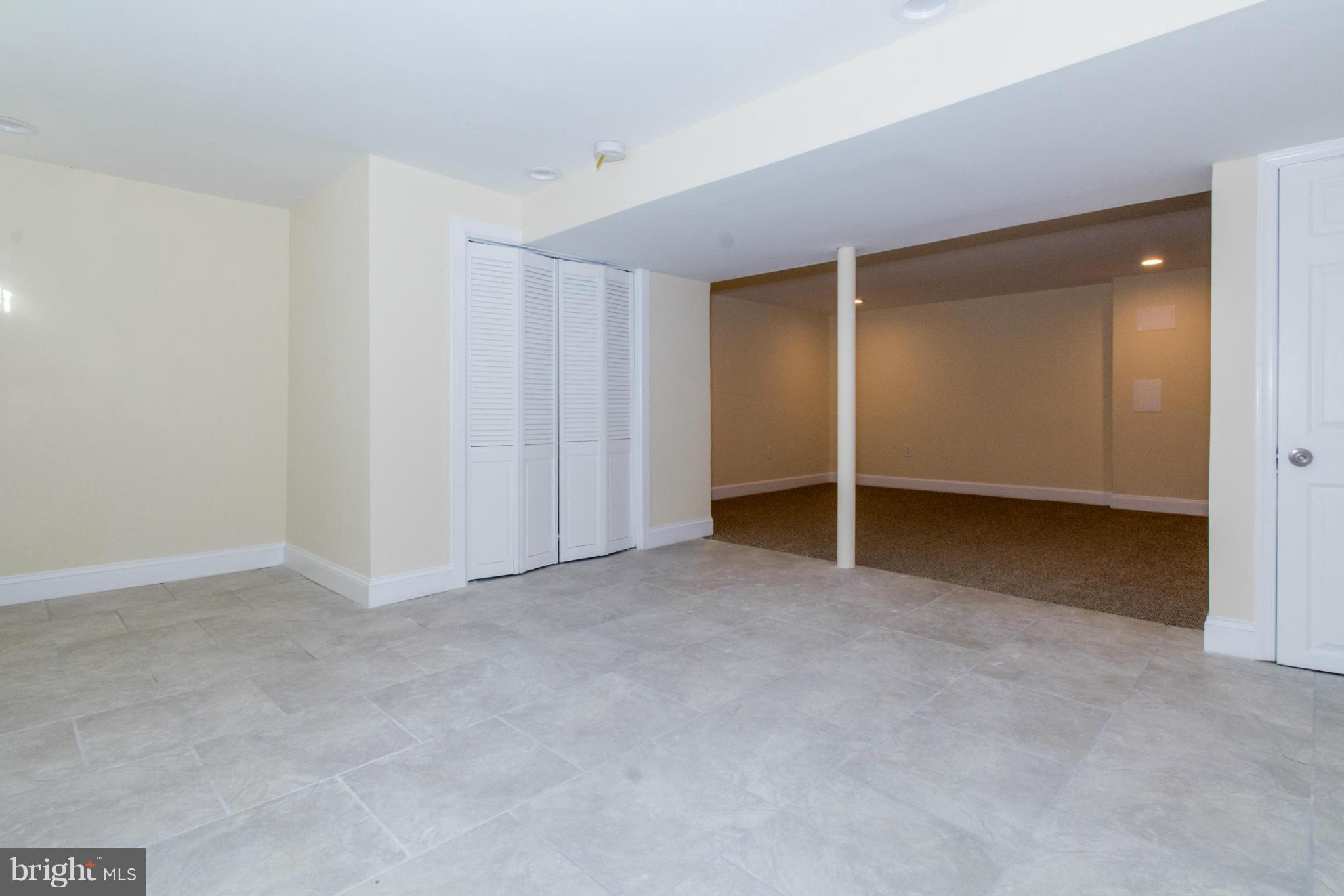 604 Brisbane Road Baltimore, MD 21229 - Photo 24 of 30 an empty room with closet area