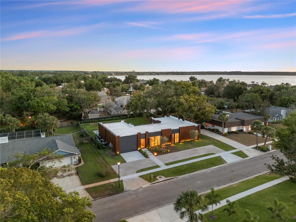 8966 Easterling Drive Orlando, FL 32819 - Photo 12 of 12 an aerial view of a house with a yard