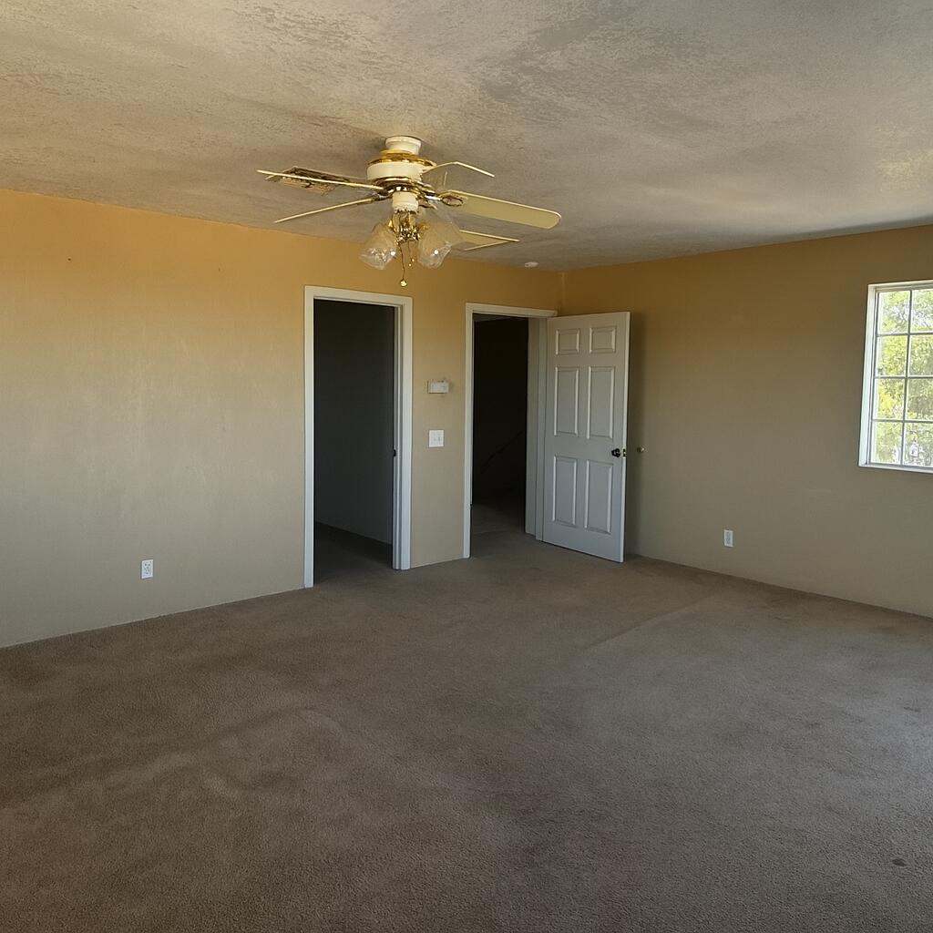 50928 Bell Road Johnson Valley, CA 92285 - Photo 10 of 27 a view of an empty room with a chandelier fan