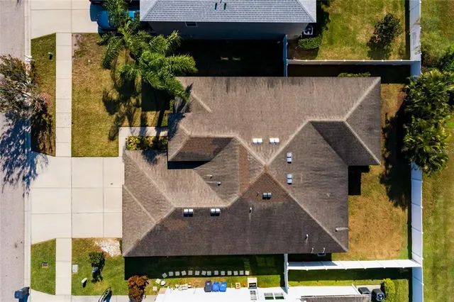 a view of a swimming pool with an ocean and trees