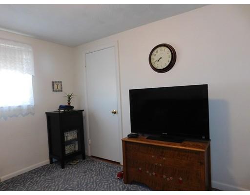 105 Hillcrest Road Waltham, MA 02451 - Photo 11 of 20 a living room with furniture and a flat screen tv