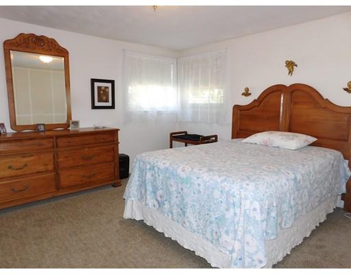 105 Hillcrest Road Waltham, MA 02451 - Photo 12 of 20 a bedroom with a bed and a dresser