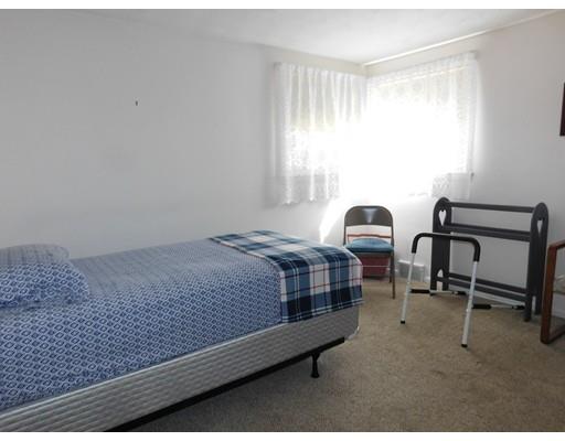 105 Hillcrest Road Waltham, MA 02451 - Photo 14 of 20 a bedroom with a bed chair and window