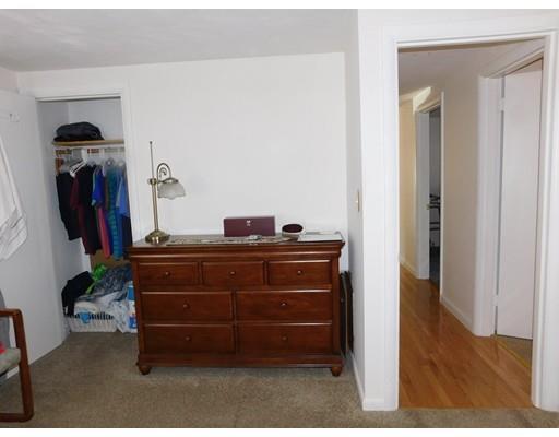 105 Hillcrest Road Waltham, MA 02451 - Photo 15 of 20 a room with a closet and mirror